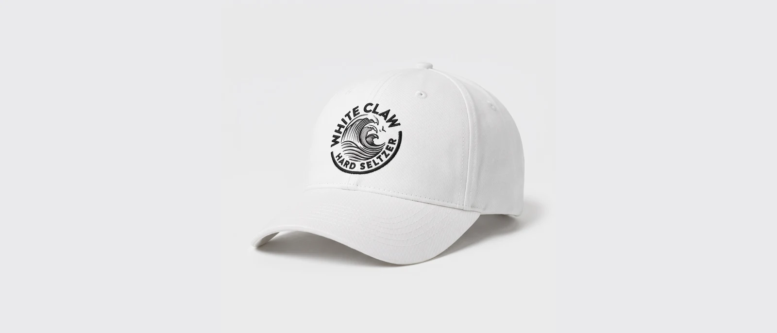 White structured baseball cap with a flat embroidered logo on the front panel
